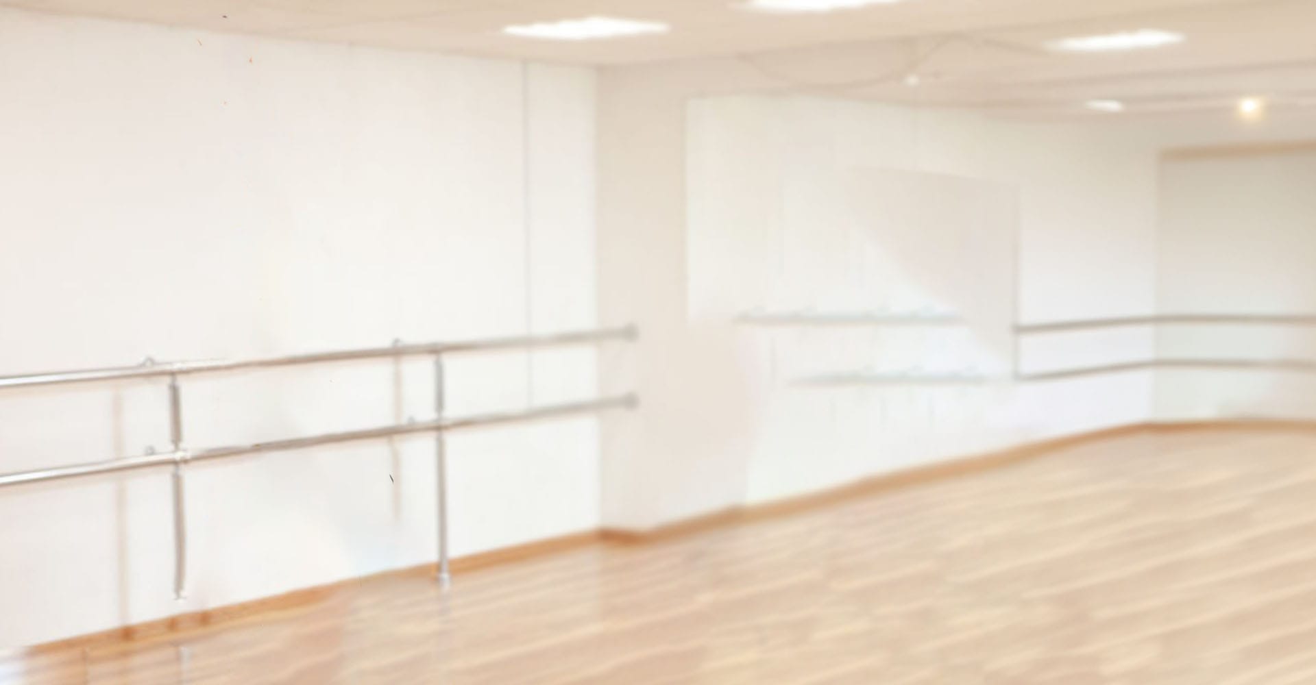 An empty dance room in the background